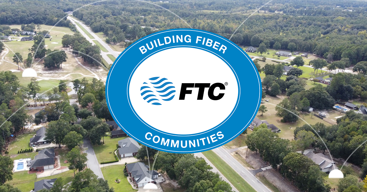 ftc internet logo over an aerial image of a town